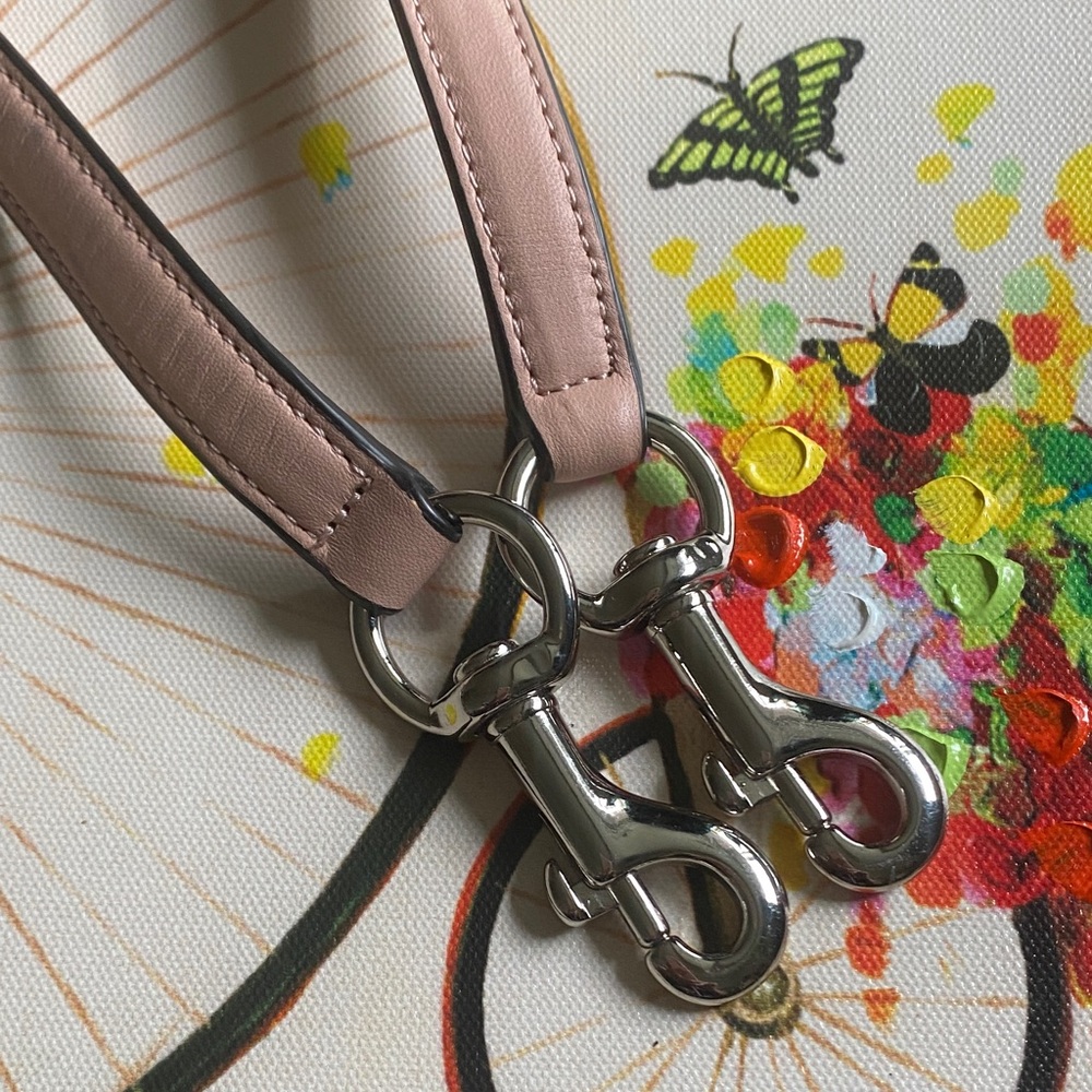 Coach Pink Leather Bag Straps with Silver Hardware.